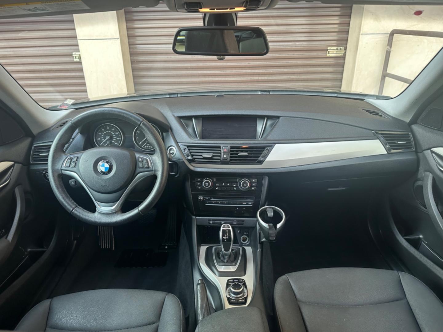 2014 Black /Black BMW X1 (WBAVM1C57EV) with an 4 CYLINDER engine, Automatic transmission, located at 30 S. Berkeley Avenue, Pasadena, CA, 91107, (626) 248-7567, 34.145447, -118.109398 - Photo#17